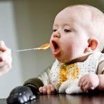 Baby-Eating-Baby-Food-Eagerly