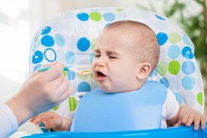 Baby Makes a Funny Face When Eating Baby Food