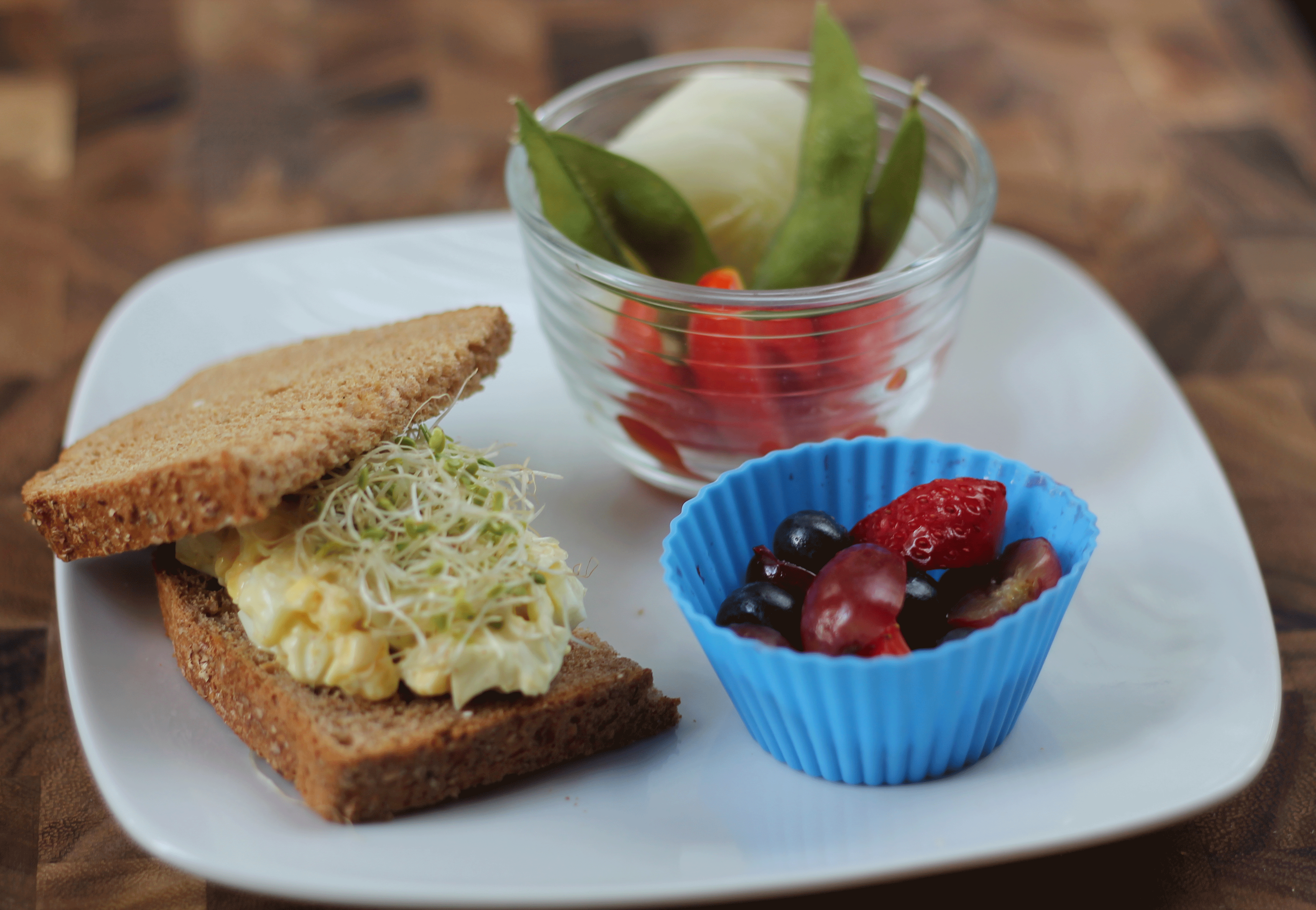 Back to School Lunch Ideas- Easy Egg Salad and Sprouts Sandwich. This super easy egg salad takes seconds to prepare. Topped with alfalfa sprouts for a fun twist.