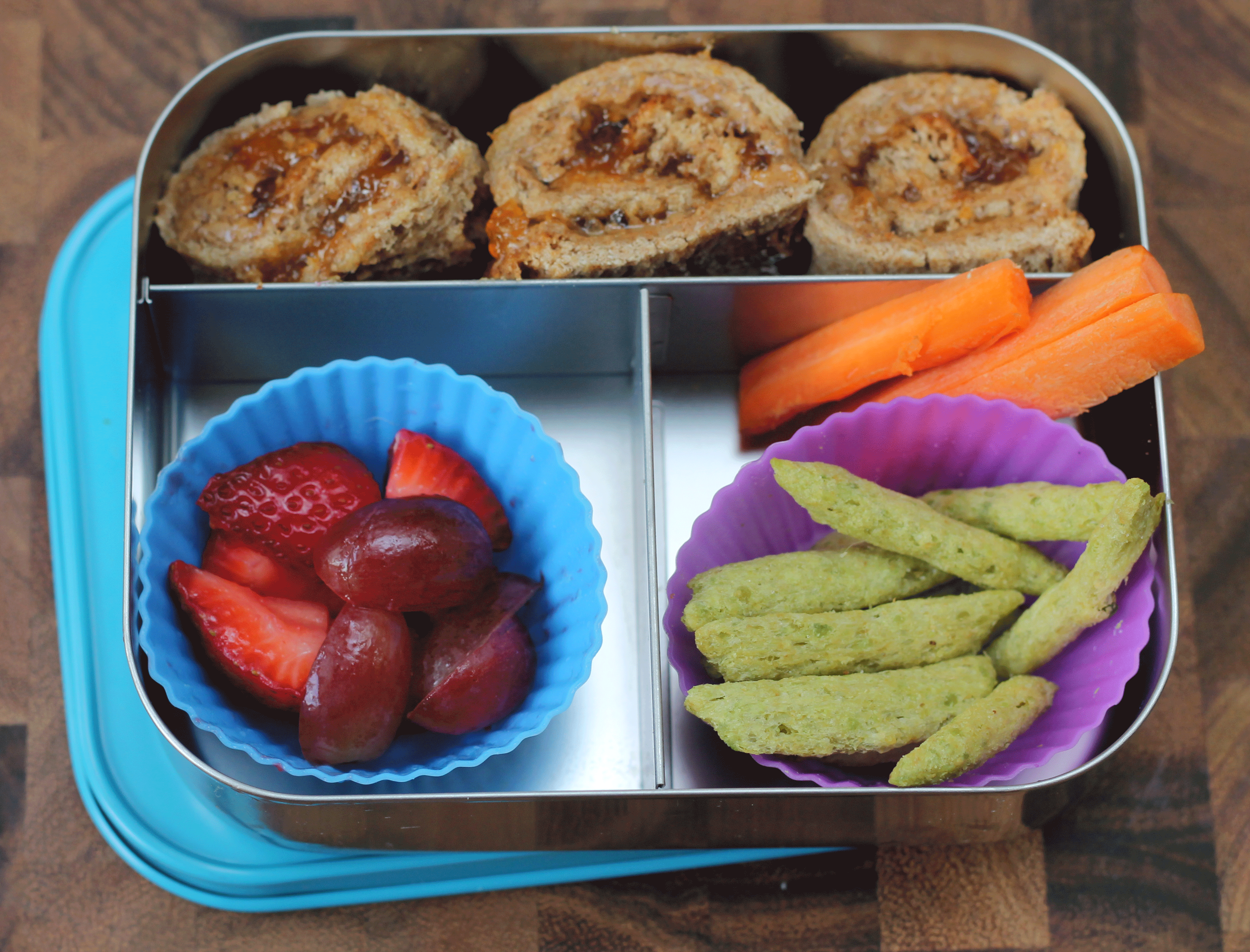 Back to School Lunch Ideas- Nut Butter and Jelly Roll Ups. A super fun take on a lunch time staple. We used almond butter and apricot preserves for a fun twist!