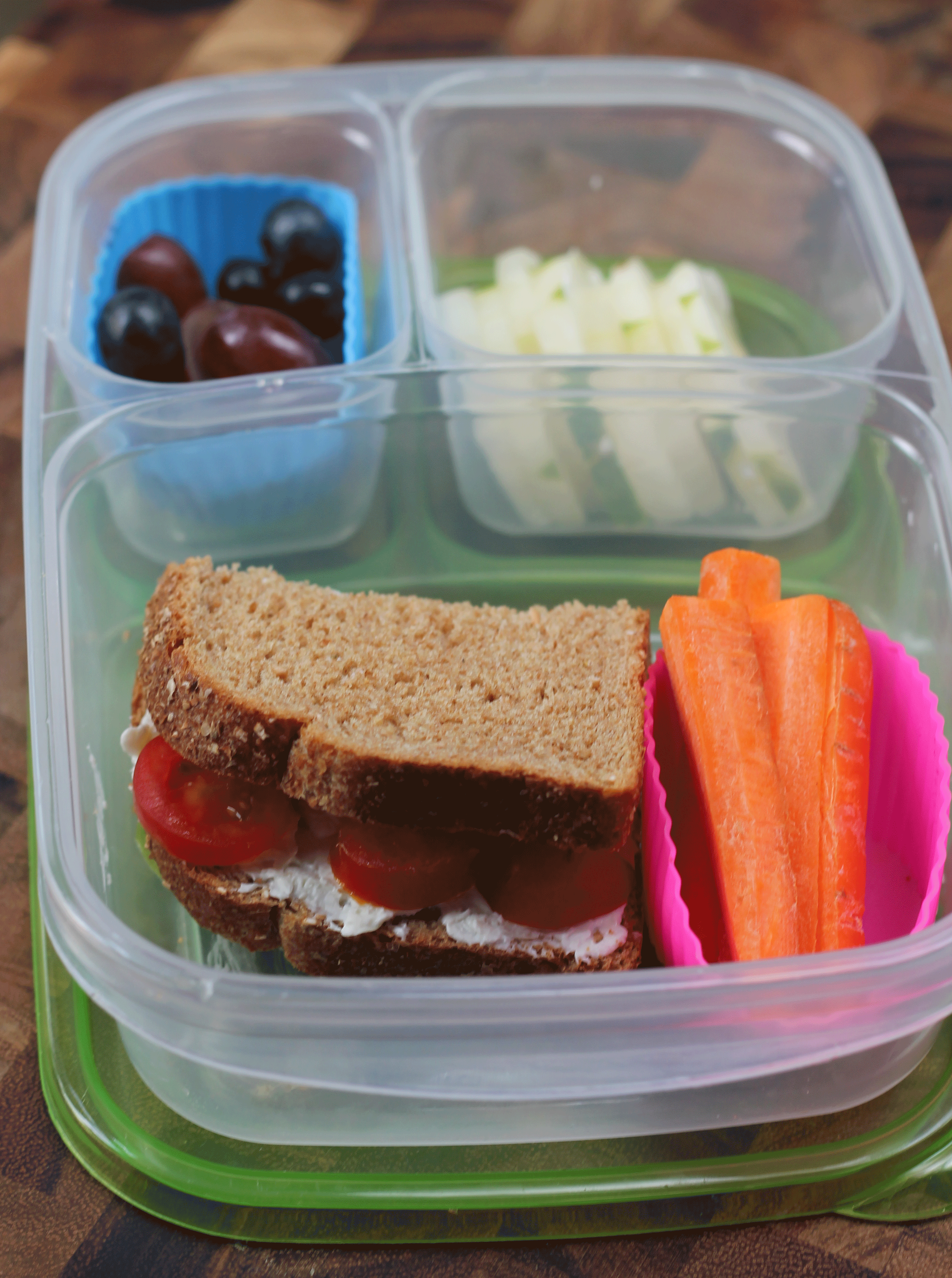 Back to School Lunch Ideas- Tomato and Cream Cheese Sandwich. A great lunch idea! You can top almost any veggie with cream cheese and the kids will love it!