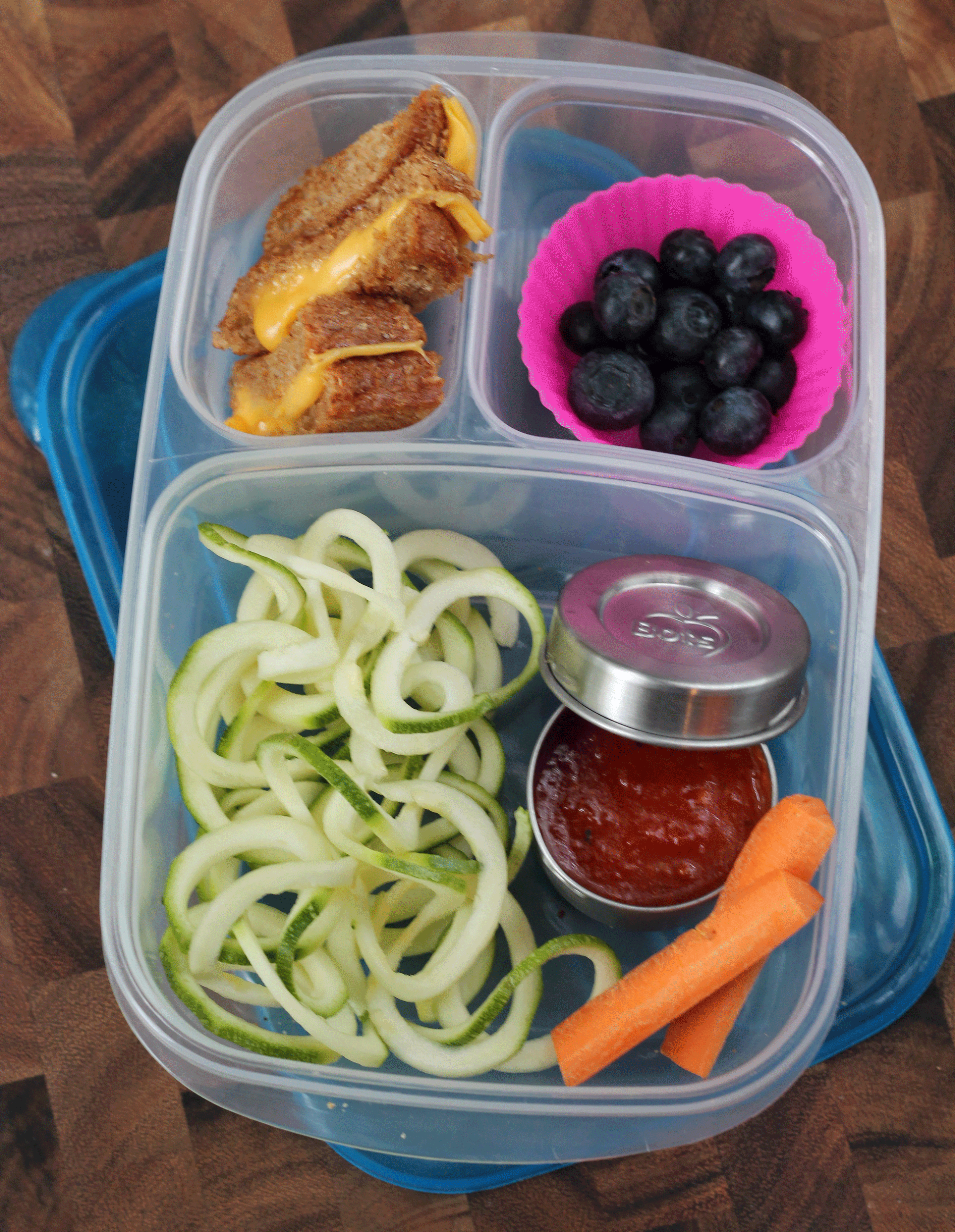 Back to School Lunch Ideas- Zucchini Noodles and Grilled Cheese. I've been obsessed with my spiralizer lately and this is such a fun lunch idea! A great alternative to regular pasta.