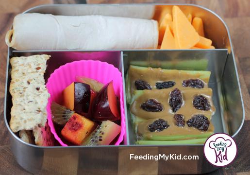 Back to School Lunch Ideas- Ants on a Log. A lunch favorite! These are made with sunflower seed butter and raisins,but you can make them with peanut butter, almond butter, or even cream cheese! You can even swap out the raisins for any other dried fruit. 