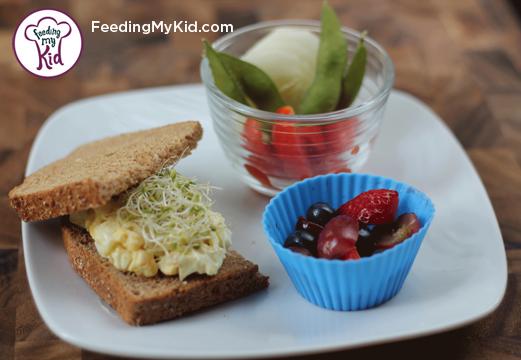 Back to School Lunch Ideas- Easy Egg Salad and Sprouts Sandwich. This super easy egg salad takes seconds to prepare. Topped with alfalfa sprouts for a fun twist. 