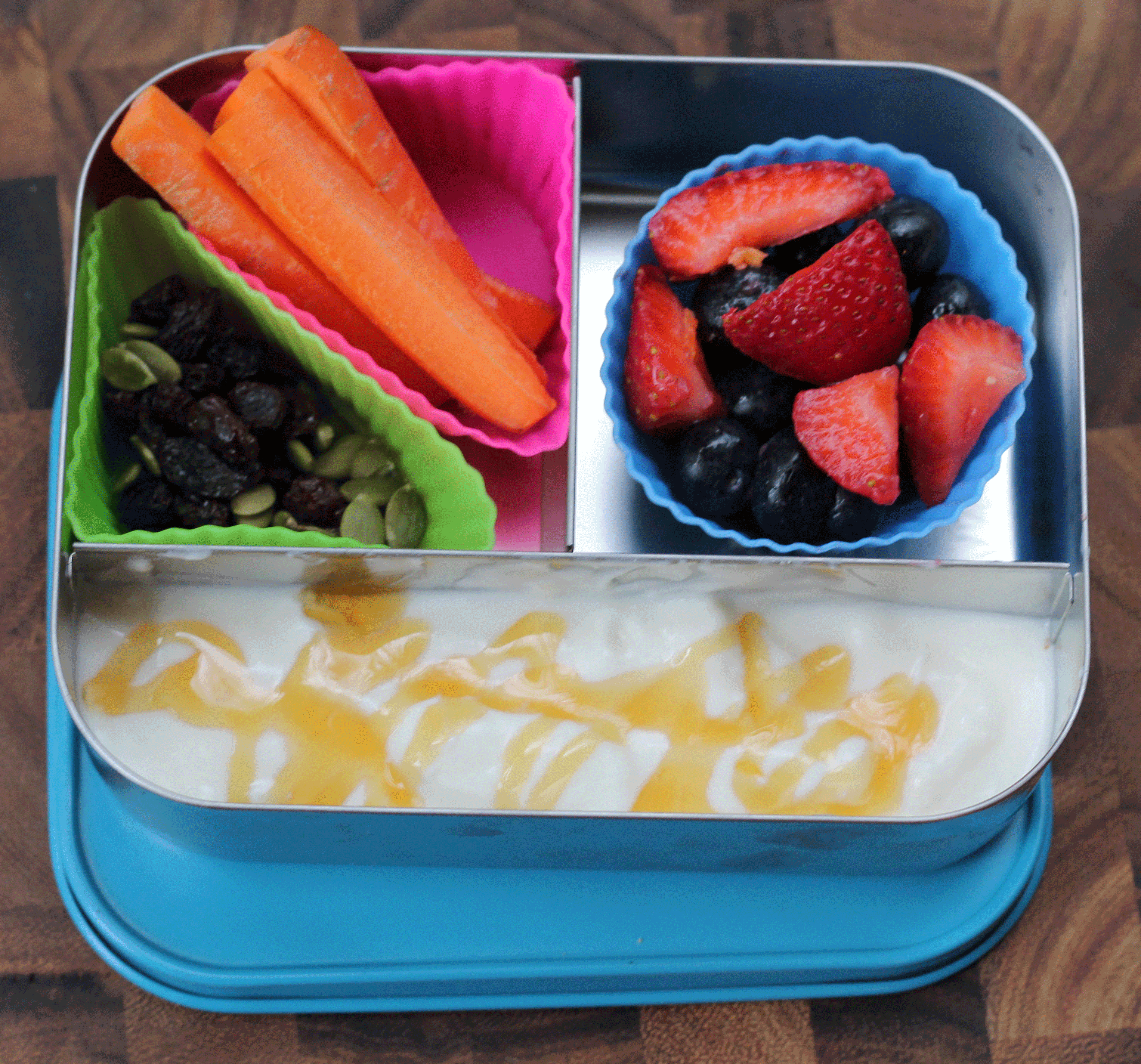 Back to School Lunch Ideas- Yogurt Parfait. SO fun! Pack this with your child's favorite yogurt flavor and fruit and let them go wild!
