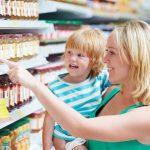 Grocery Shopping with Kids Looking at Food Labels