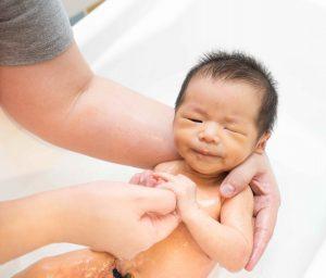 Newborn Taking a Bath