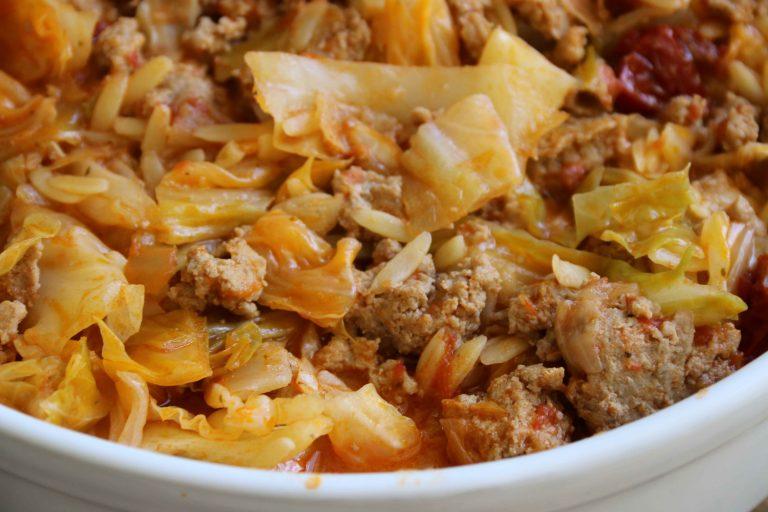 What an incredibly easy one-pot dish to serve! You'll friend and family will be so impressed. This Cabbage Turkey Casserole is absolutely delicious, easy to make and easy to clean up afterward. Looking for an easy to make casserole? #healthycasserole #turkeycasserole #cabbagecasserole