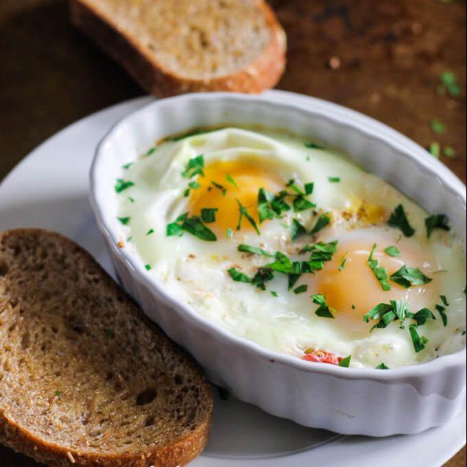 Baked Eggs With Tomatoes And Feta Cheese