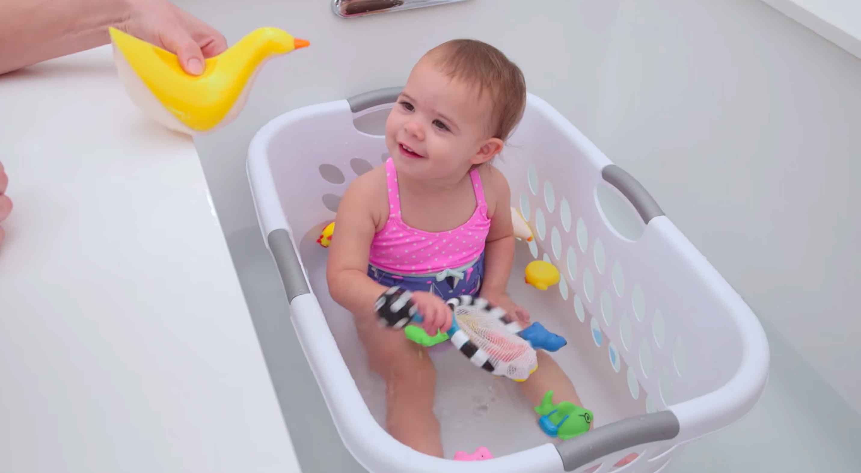 Create a bath barrier for younger kids.