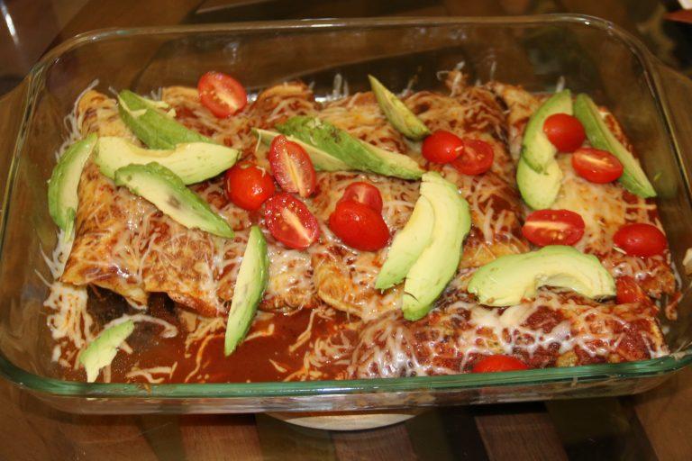 These chicken enchiladas use whole ingredients and are completely homemade. They make a great weeknight dinner, potluck dish, or dinner party dish.